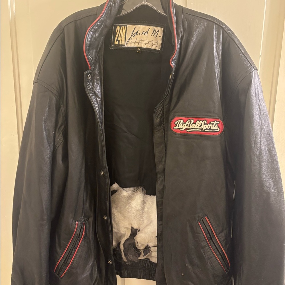 Black Bomber Leather Jacket with Ribbed Collar and Red Accents